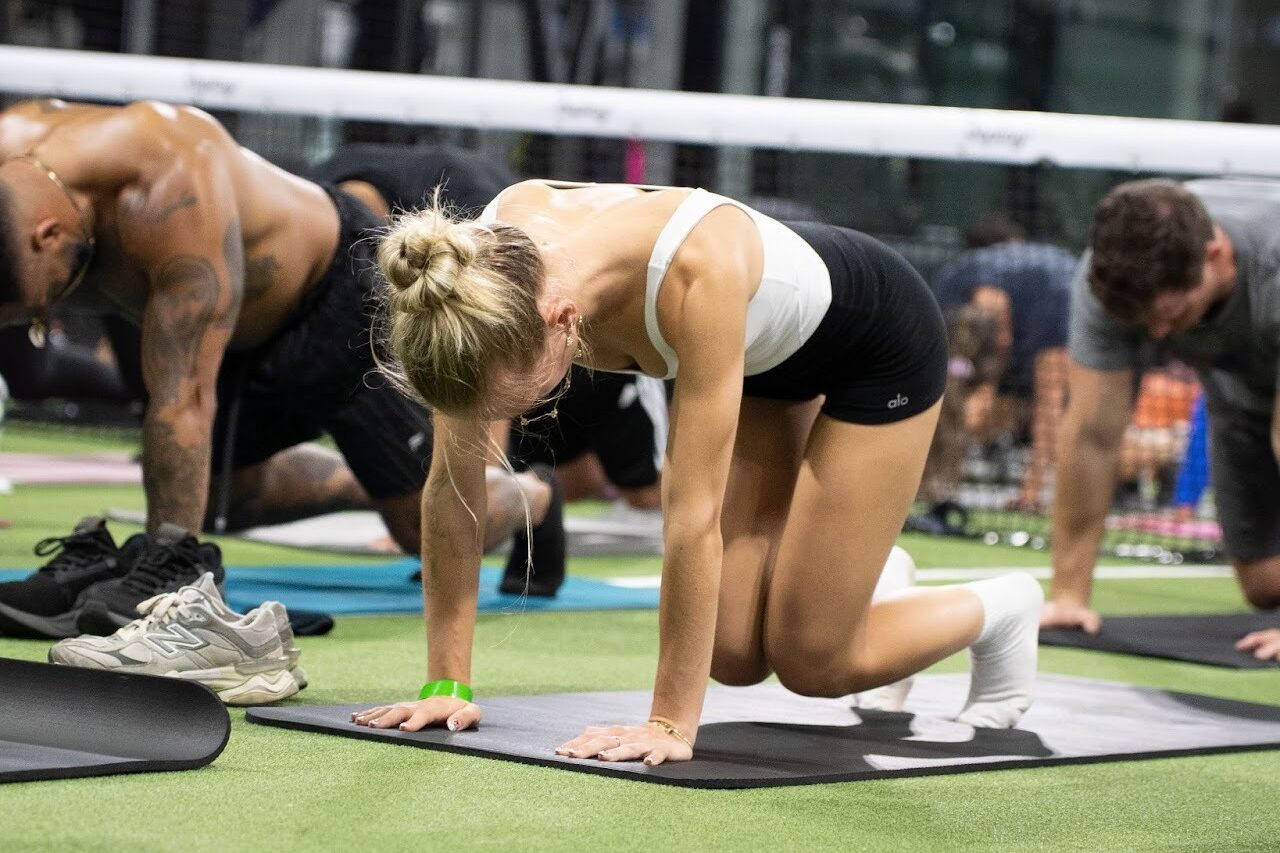 A group of people working out at Replay Club in Boynton Beach. 