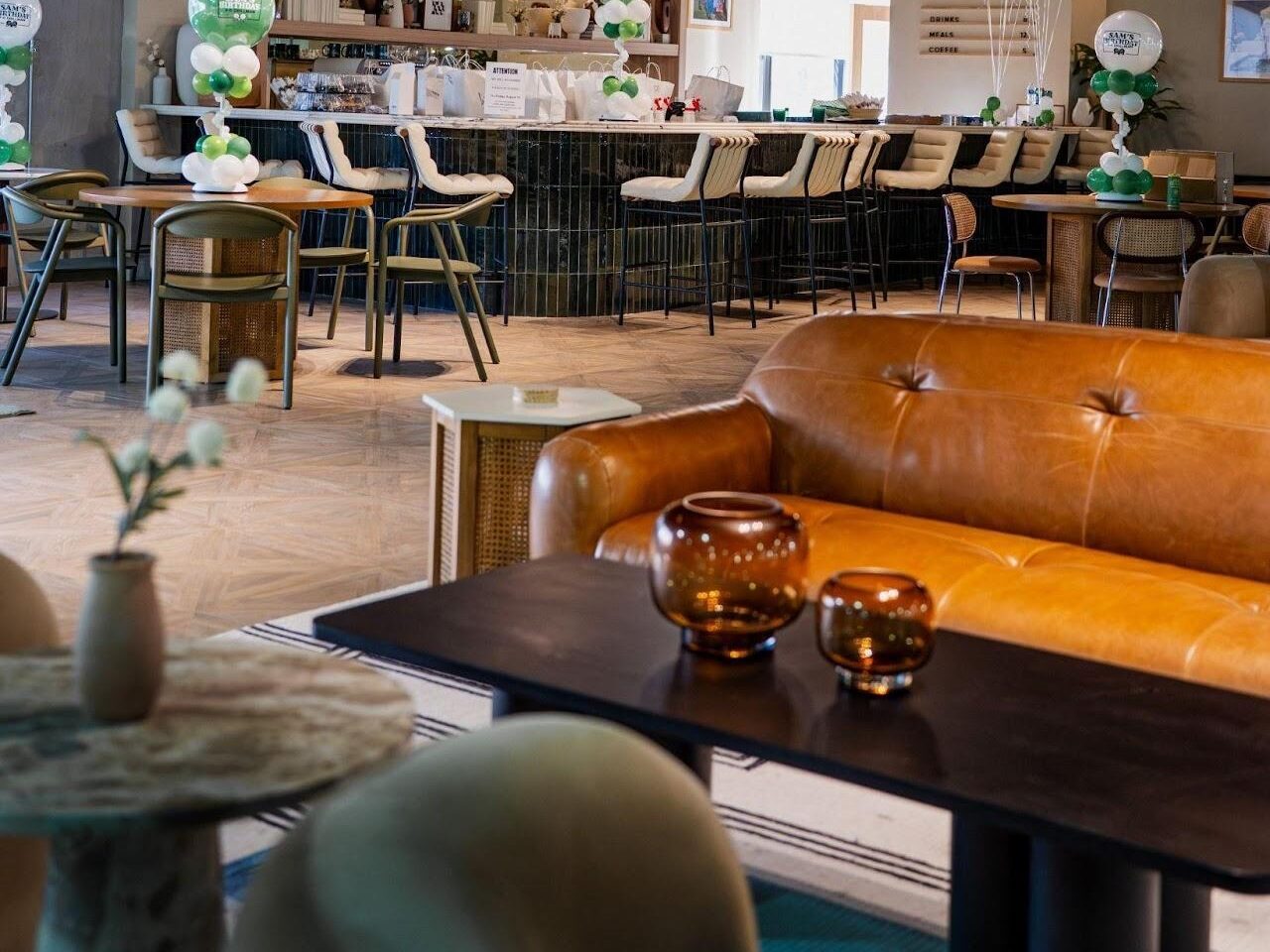 Interior of the Replay Club members' lounge showing a Soho House-inspired social space.